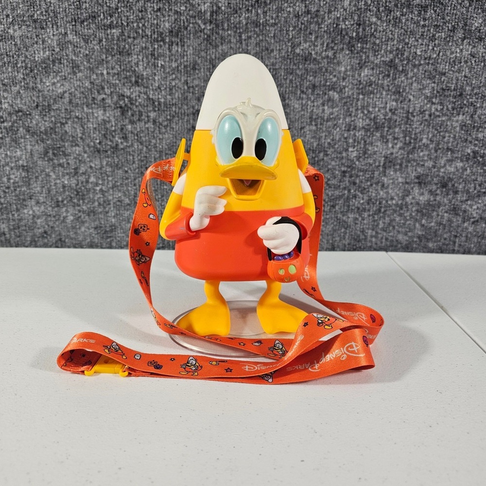 Disney Parks Donald Duck Candy Corn Halloween Sipper Glow In Dark w Lanyard 2023